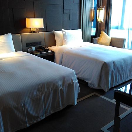 Wanda Realm Hotel Дунъин Номер фото