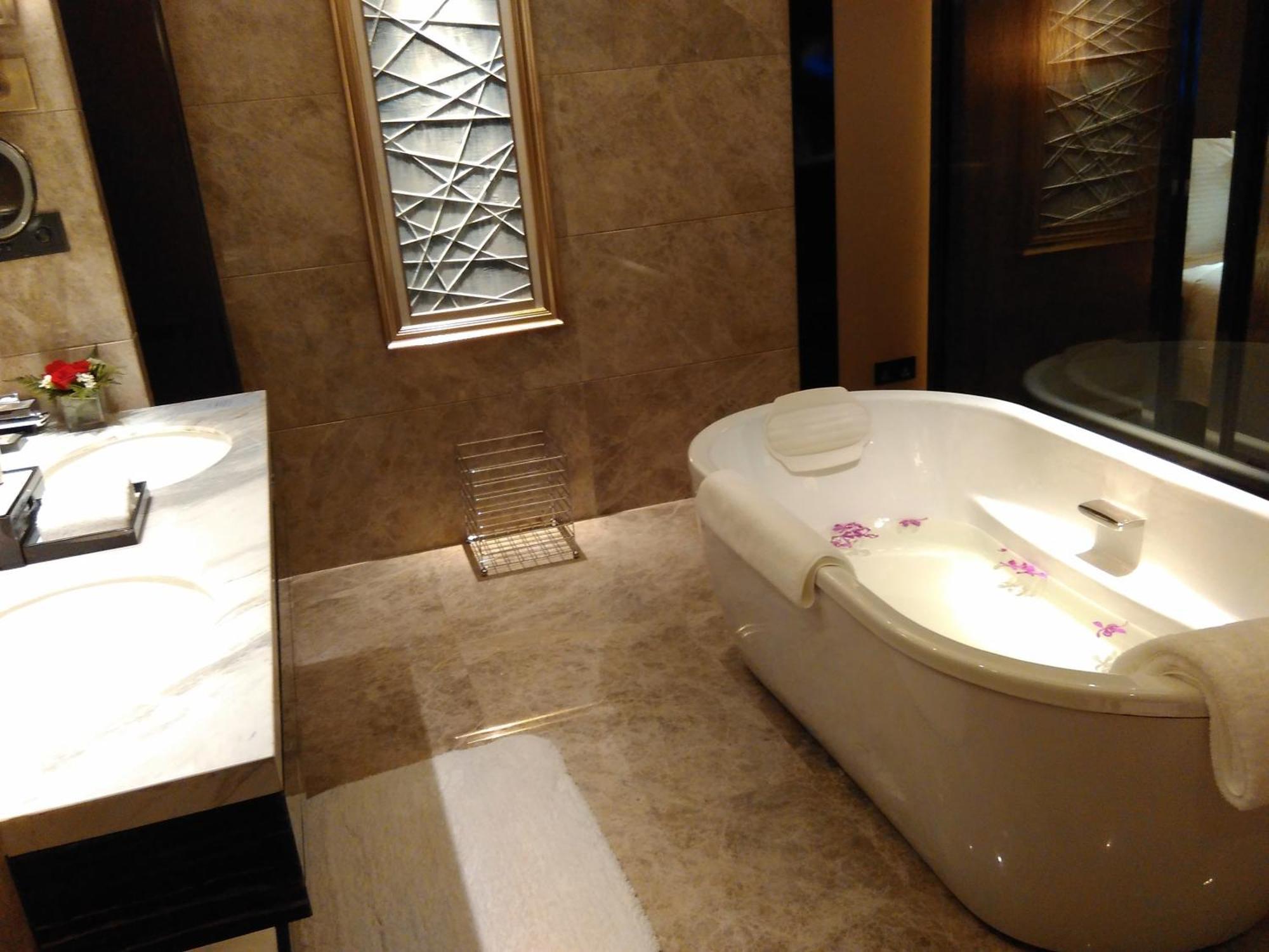 Wanda Realm Hotel Дунъин Номер фото