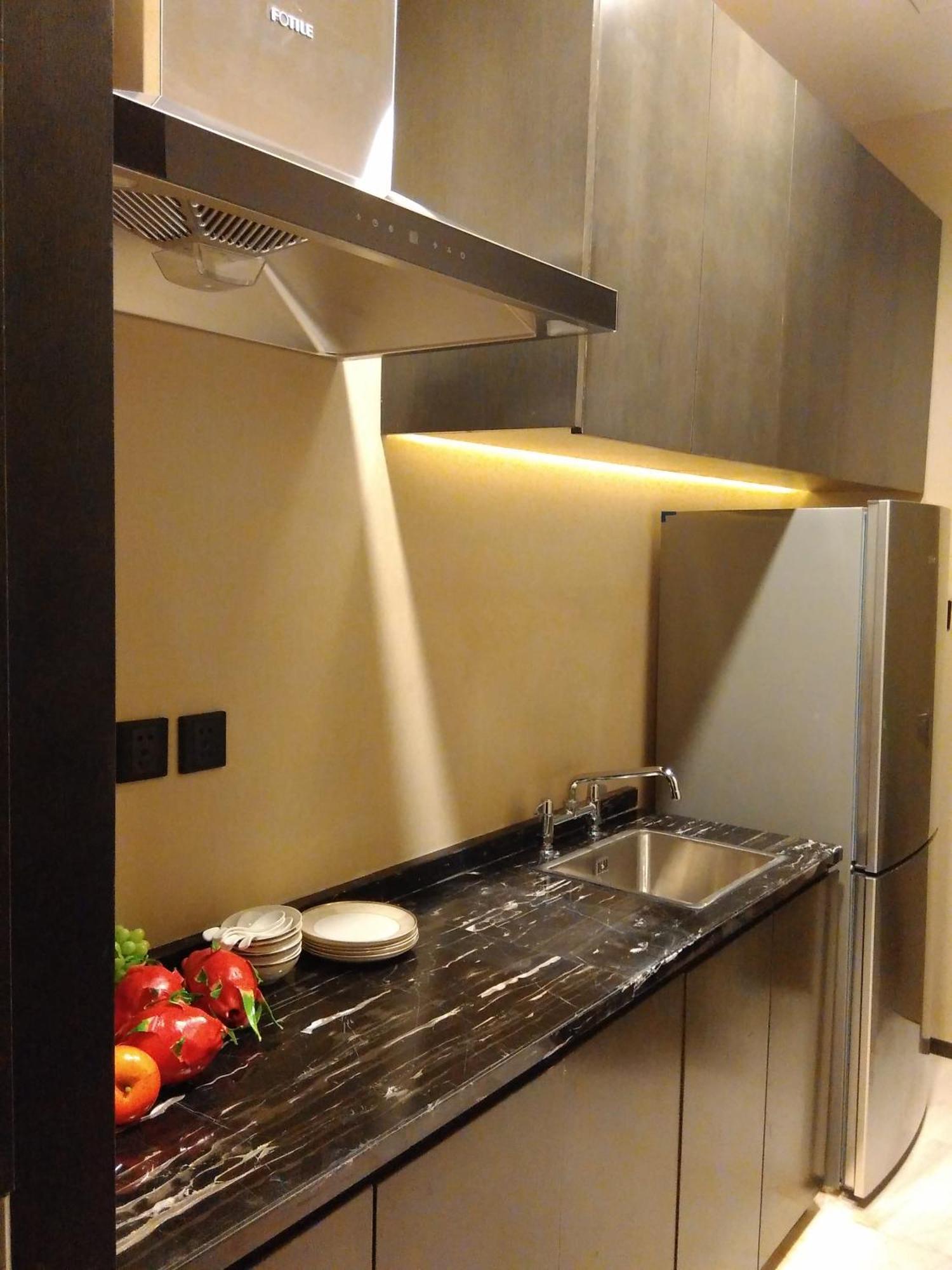 Wanda Realm Hotel Дунъин Номер фото