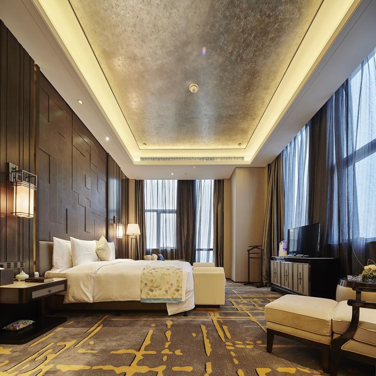 Wanda Realm Hotel Дунъин Номер фото