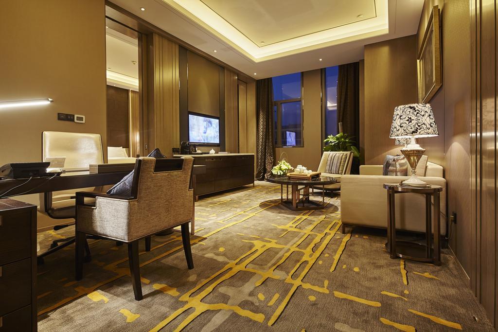Wanda Realm Hotel Дунъин Номер фото