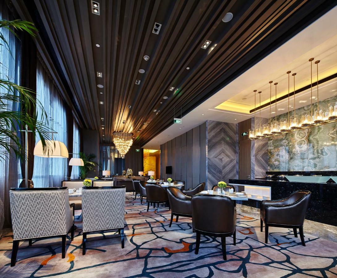 Wanda Realm Hotel Дунъин Экстерьер фото