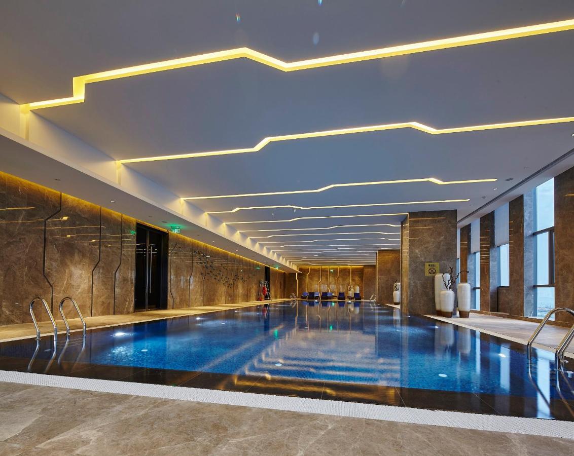 Wanda Realm Hotel Дунъин Экстерьер фото